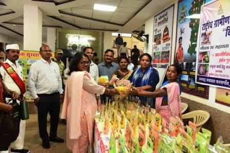 Self-help group set up herbal gulal stall in the district office